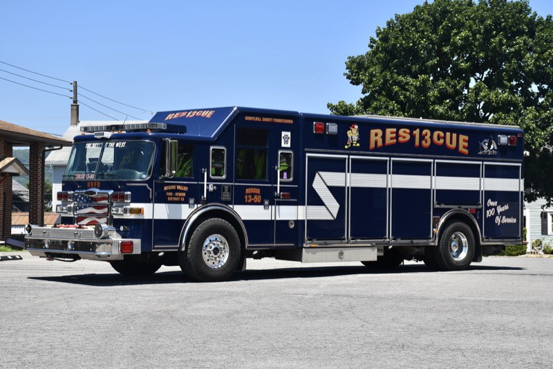 Rescue 13-50, a navy blue and white 2007 Pierce Dash walk-around heavy rescue, from the front quarter. Photo: Mike and Andrew Sanders.